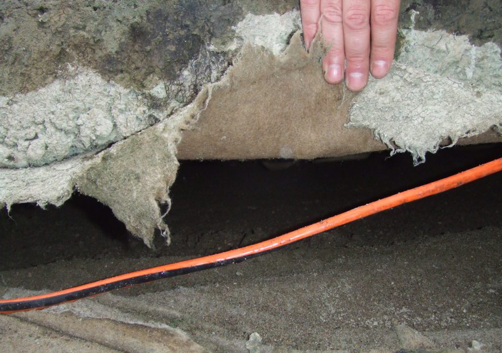 Open void discovered beneath a concrete slab prior to void filling grouting