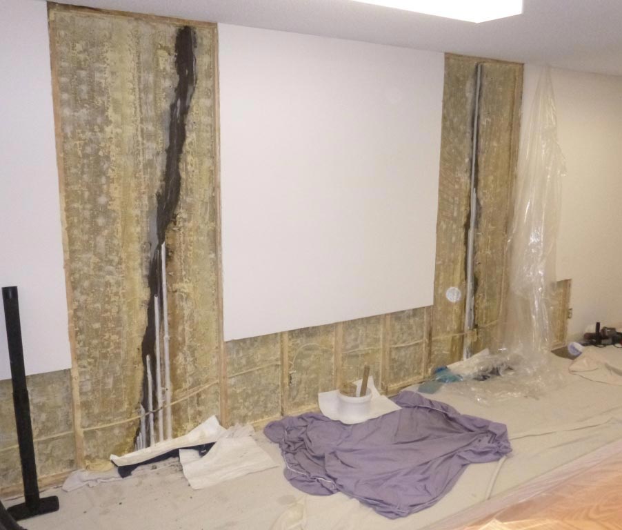 During: injection ports installed along foundation wall cracks ahead of resin injection