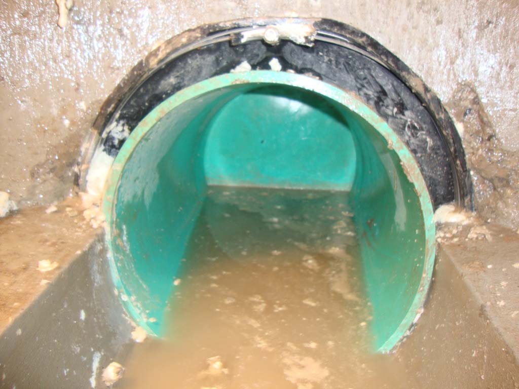 Sealed pipe penetration in a precast manhole after injection grouting
